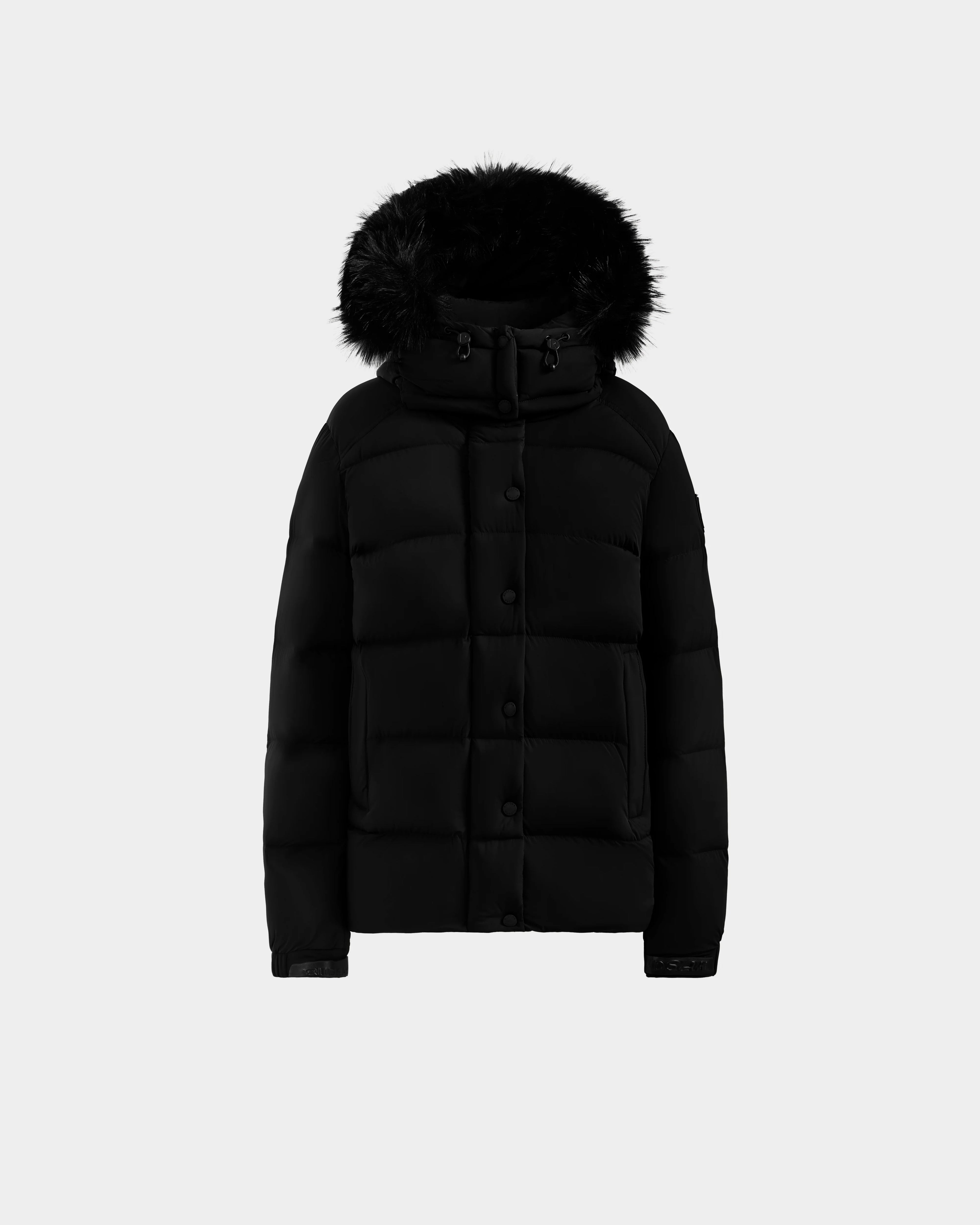 The Rudsak BREE M - L125582 Black women’s down puffer jacket features a removable black faux fur-trimmed hood, button and zipper closures, and is shown against a plain light background.
