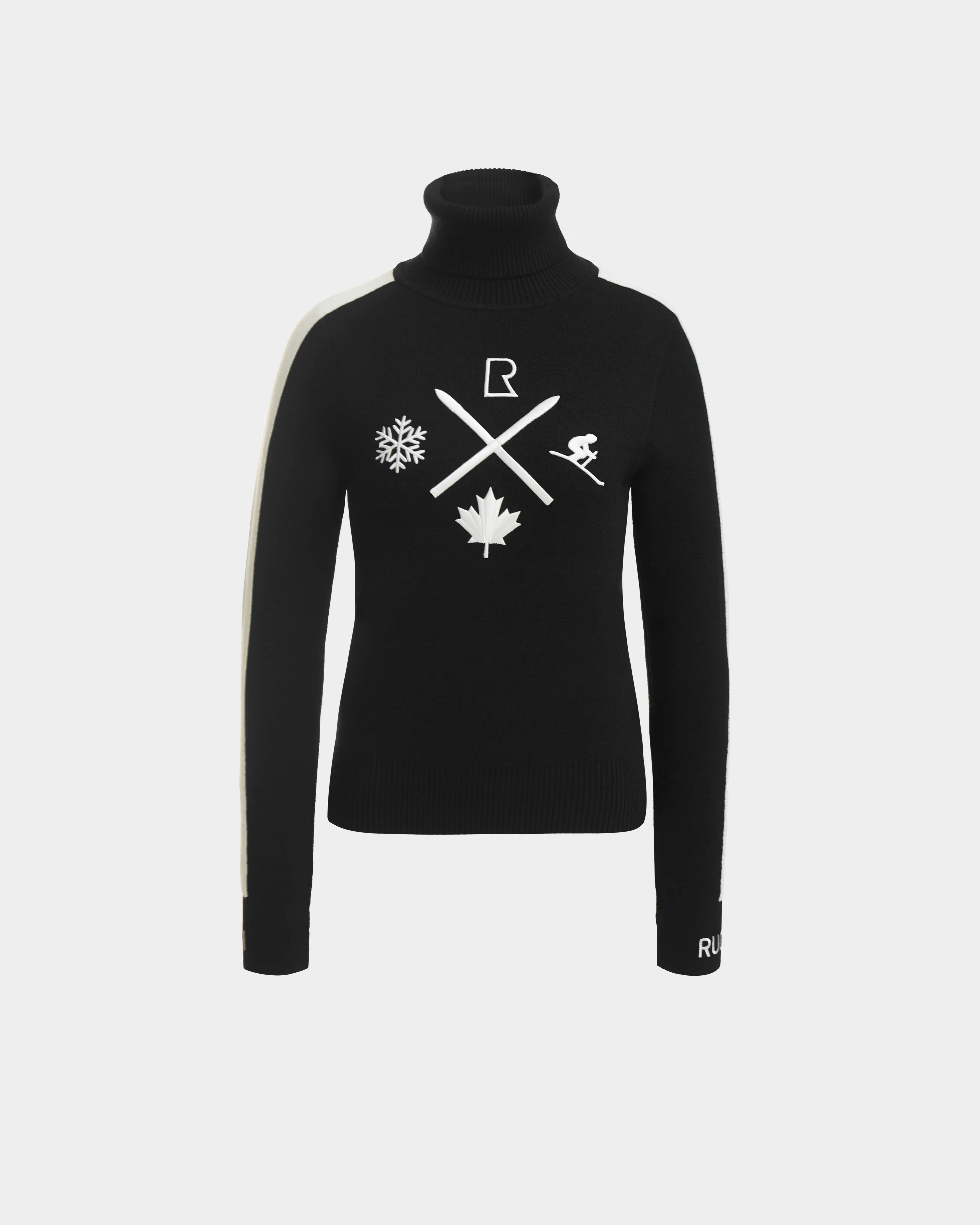 The ELIZABETH - 8524623 Black turtleneck by Rudsak features white graphics—snowflake, maple leaf, skier, and R—on crossed lines, plus a bold white sleeve detail. A stylish pick for winter wear or après-ski.