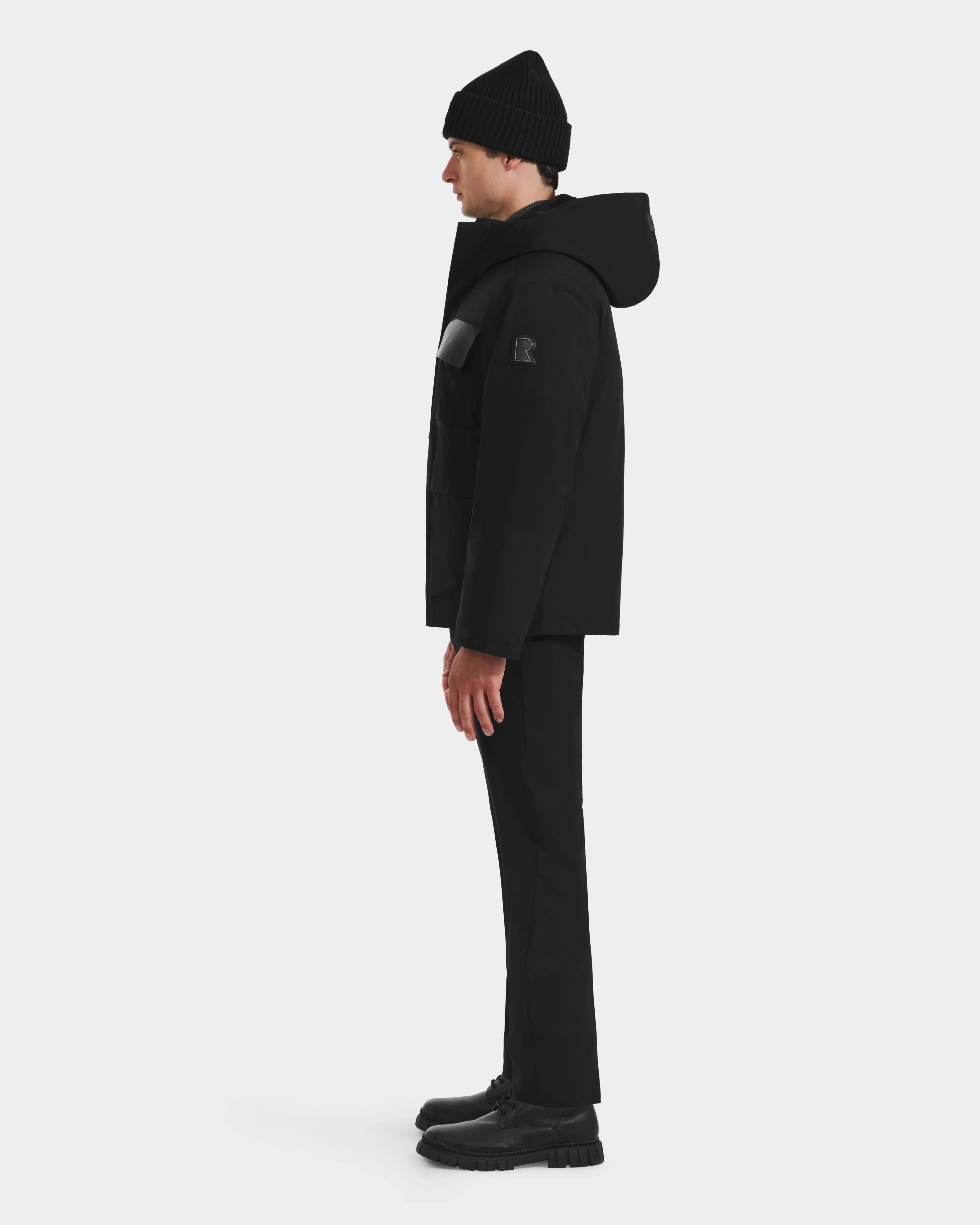 A man in the Rudsak LAZIO - 6125527 Black parka, the perfect winter essential.