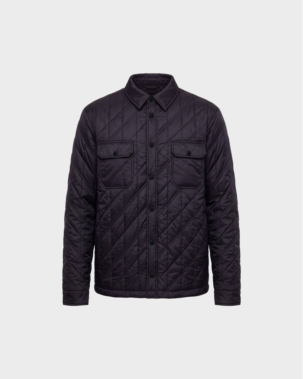 GRIFFIN - 6126758 Black quilted jacket by Rudsak, featuring a button-up front, two chest flap pockets, and a collar, displayed on a plain light gray background.
