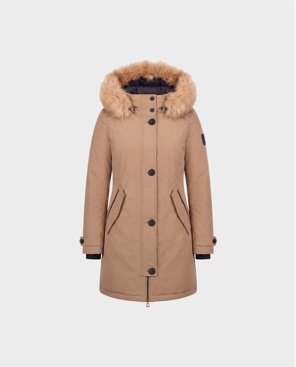 The Rudsak KEYSHIA - 8126517 Camel women’s down parka features a faux fur-lined hood, black buttons, front zipper, two front pockets, and a patch on the left sleeve. Crafted with ethically sourced RDS-certified down for cozy winter warmth, this stylish tan parka is displayed against a plain light gray background.