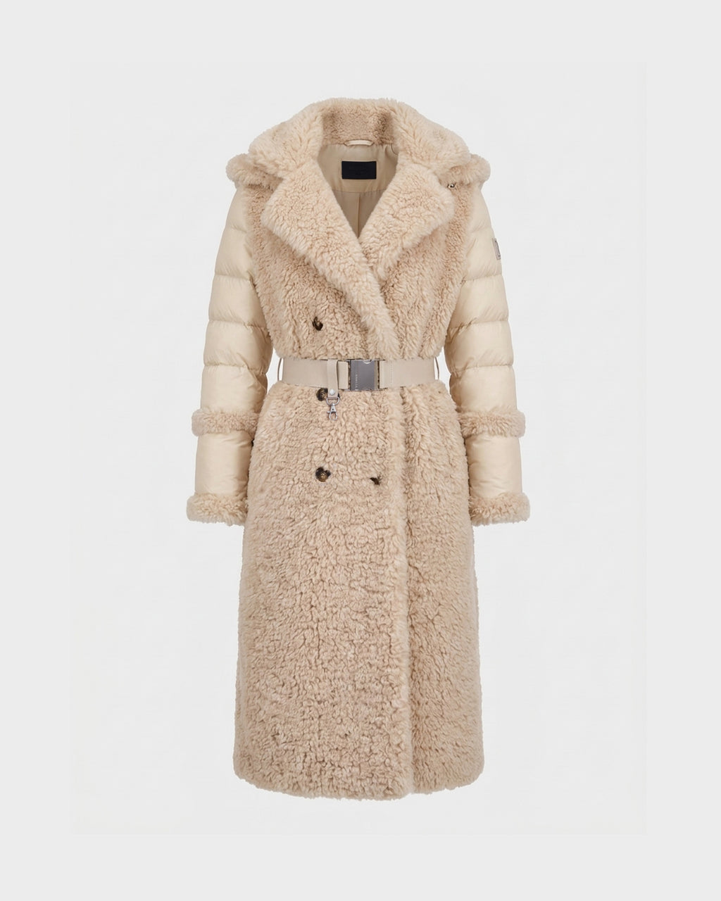 The NOELLE - 8126971 Cream by Rudsak is a long, beige winter coat featuring a plush faux fur front and collar, quilted sleeves resembling a classic down coat, a belted waist, and double-breasted button design, shown against a plain white background.