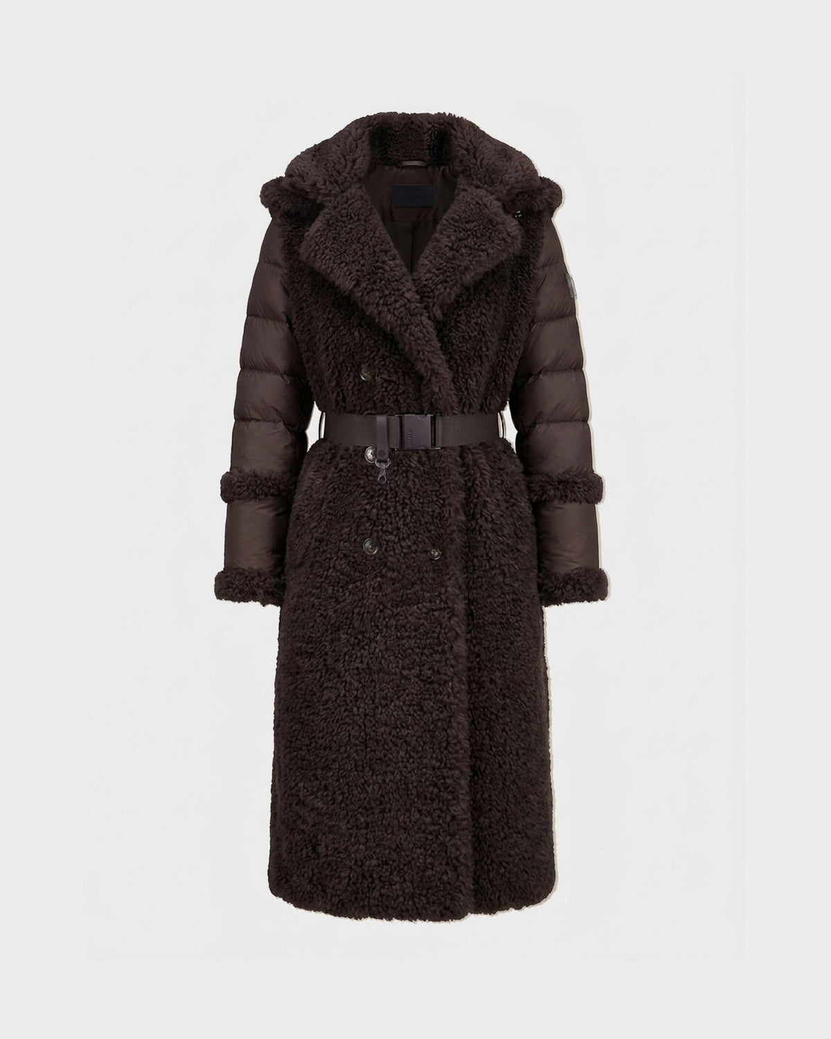 The NOELLE - 8126971 Espresso by Rudsak is a long, dark brown belted shearling coat with quilted sleeves and a large collar, featuring luxurious faux fur accents, displayed against a plain, light background.