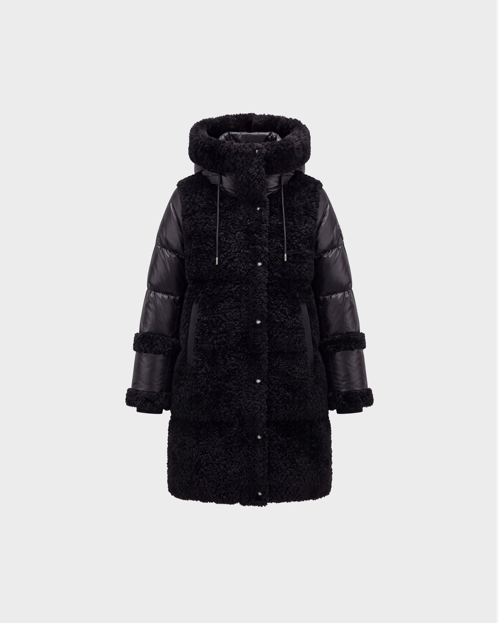 The SHELLEY - 8126729 Black coat by Rudsak features a puffy, quilted design on the sleeves and sides, sherpa-textured panels on the body, a large hood, front buttons, and adjustable drawstrings. It is displayed against a plain light gray background.