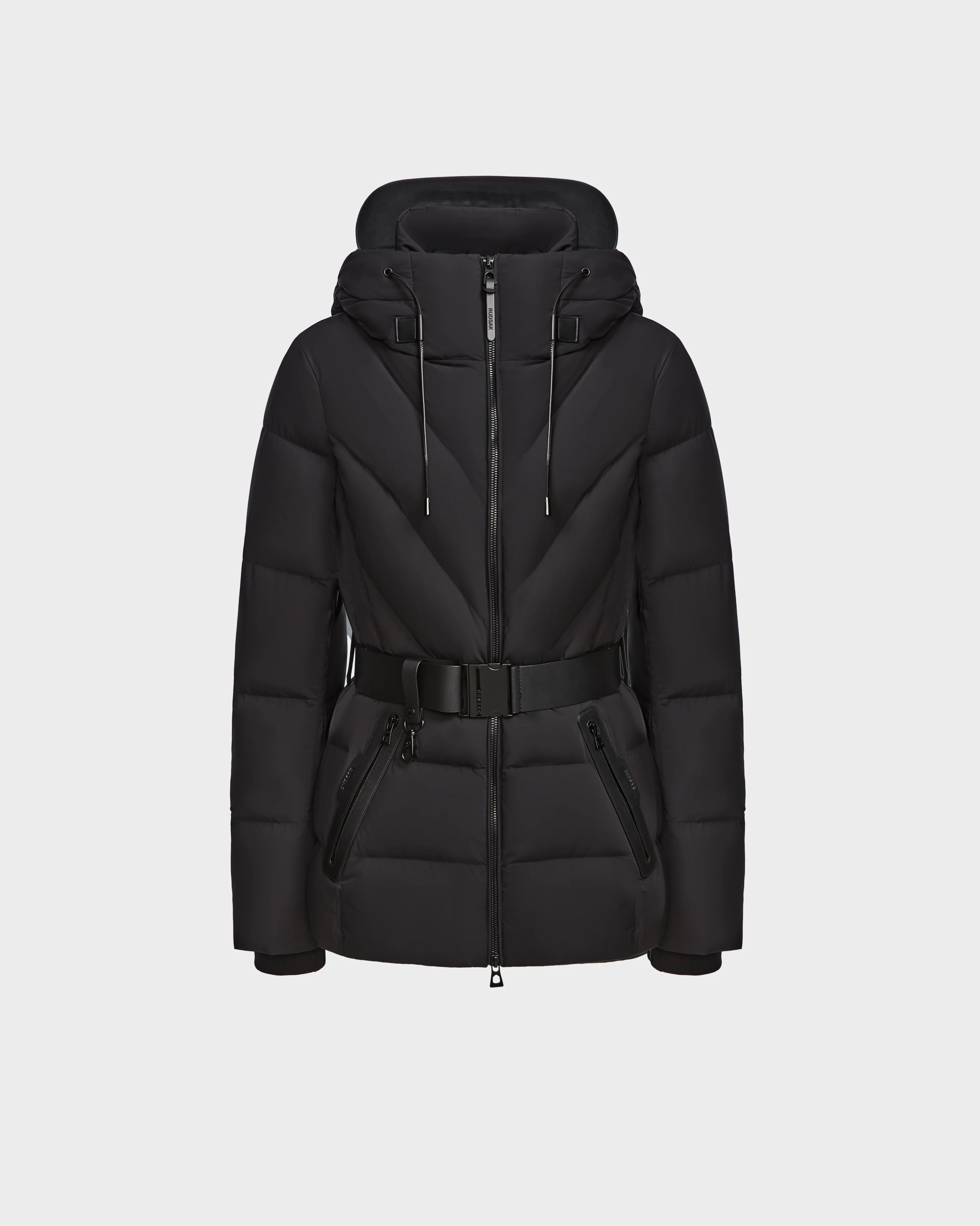 The Rudsak ENZAH - 8124692 Black is a womens hooded down puffer jacket with a belted waist, front zipper, and two zippered side pockets, made from RDS-certified down and shown on a white background.