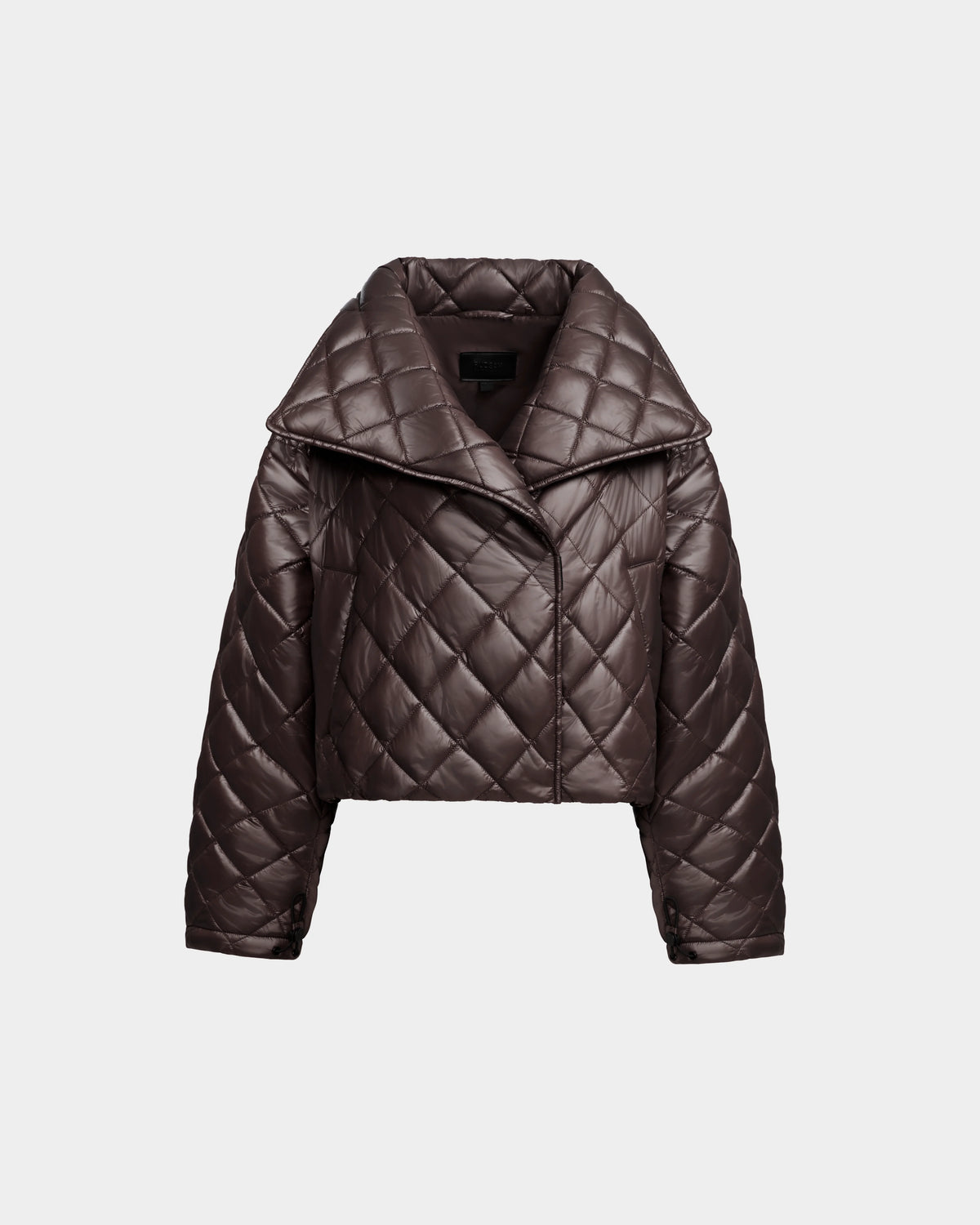 The Rudsak KALEE - 8124005 Espresso is a women's dark brown quilted light jacket with a cropped silhouette, wide collar, and diamond stitching, shown on a plain light gray background.