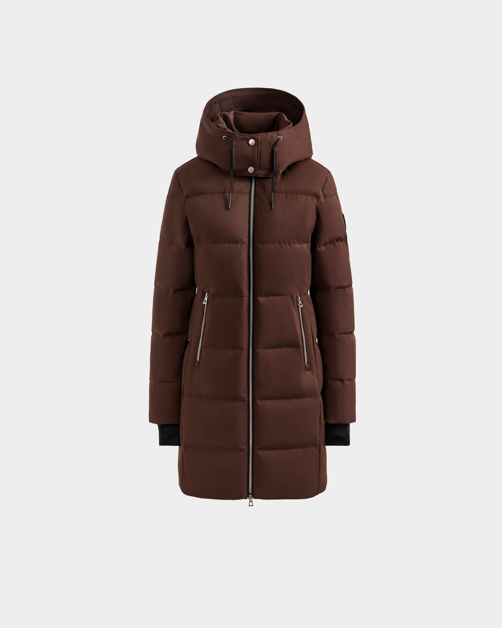 The Rudsak MIRIAM - L123544 Mocha is a long brown women’s down puffer jacket with hood, front zipper, zippered pockets, and black cuffs—an essential winter piece shown on a plain light background.